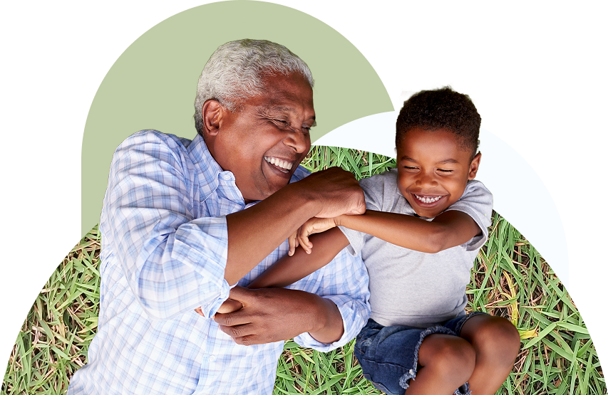 Grandfather and grandson laughing together